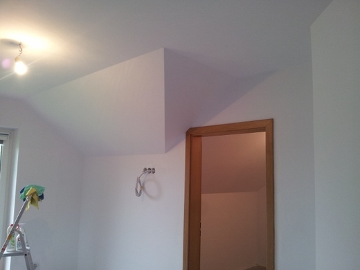 14.strojní nanášení výmalby.jpg